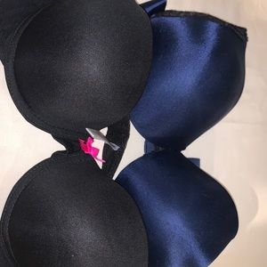 Bundle of black and blue bras.